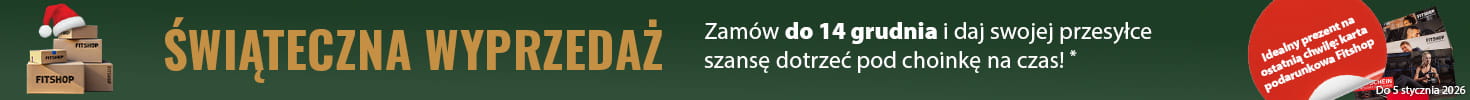Świąteczny baner z zielonym tłem i girlandą świateł u góry. Po lewej stronie znajdują się paczki z logo „Fitshop”, obok widoczne są karty podarunkowe Fitshop. W czerwonym polu widnieje napis: „Idealny prezent na ostatnią chwilę: karta podarunkowa Fitshop”. Po prawej stronie duży napis „Christmas Sale” oraz dopisek: „Dostawa przed Świętami dla zamówień złożonych do 14.12.2025!”